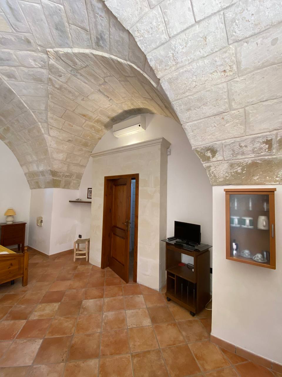 Volta a stella in pietra leccese di una camera della masseria